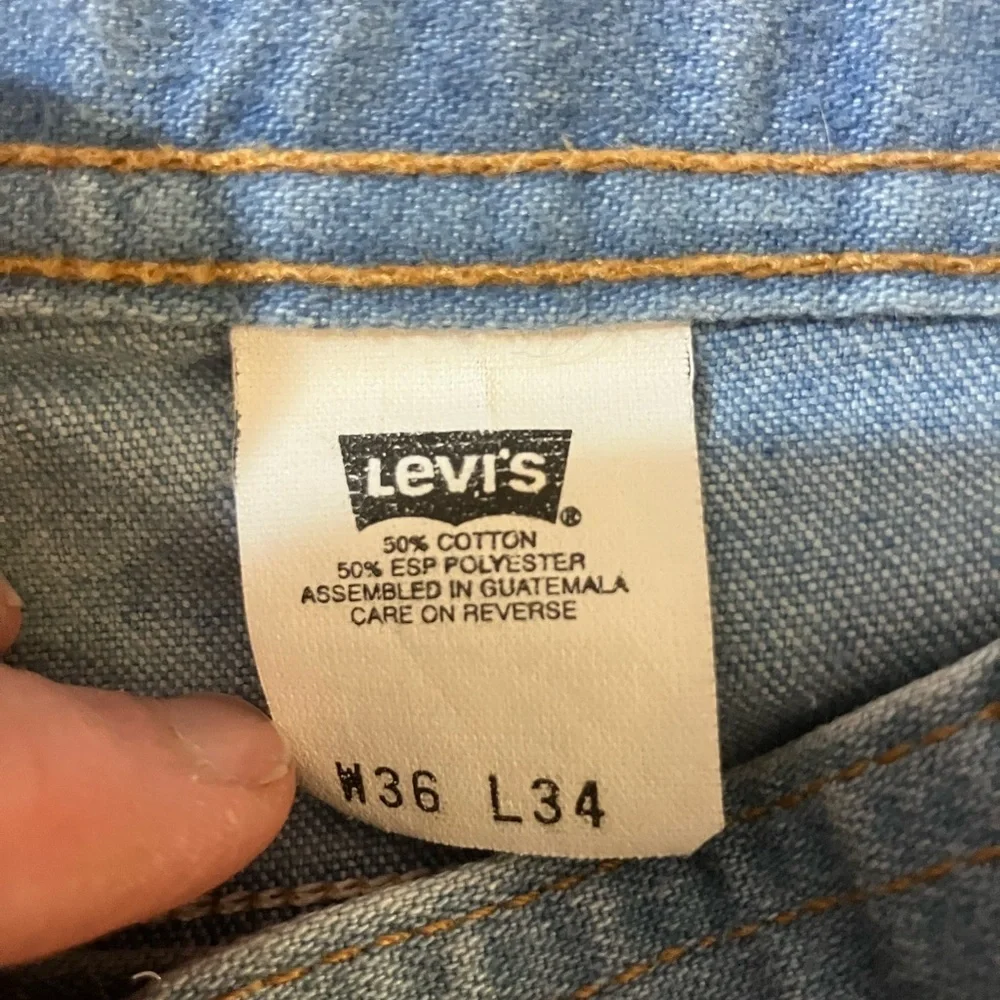 Levi’s 1999 34x 33 cotton blend denim jeans w decorative pockets